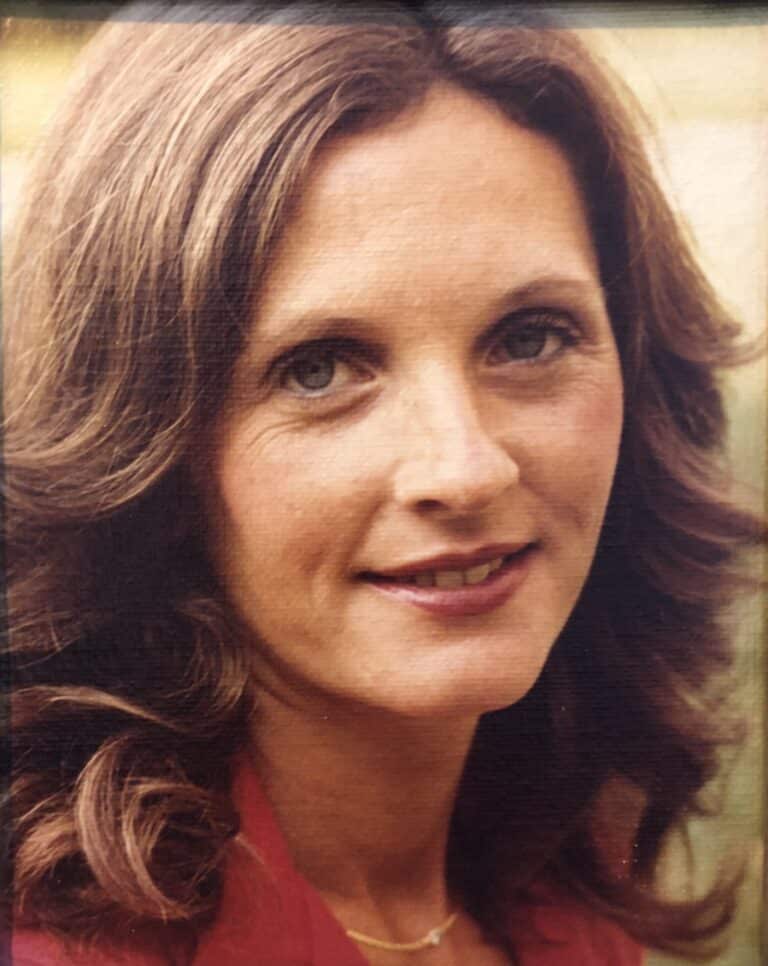 May contain a person with shoulder-length brown hair.