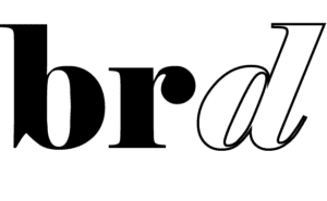 A person wearing a tie holds a large magnifying glass up to their eye, enlarging one eye. The image is a simple black-and-white line drawing with no background.