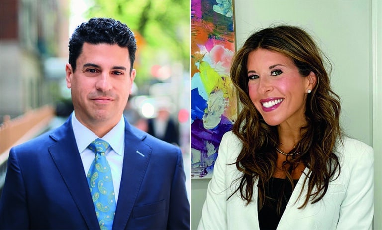 A man in a blue suit and tie stands outdoors. A woman in a white blazer stands indoors in front of a colorful painting. Both are facing the camera and smiling slightly.